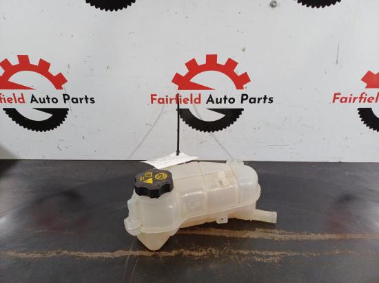 2011 Holden Barina — Overflow Bottle