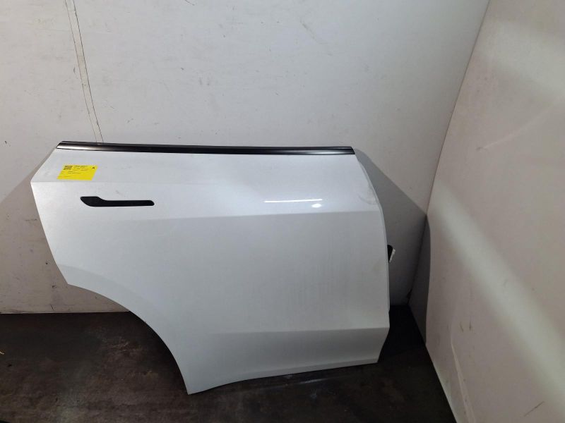 2024 Tesla Model Y — Right Rear Door