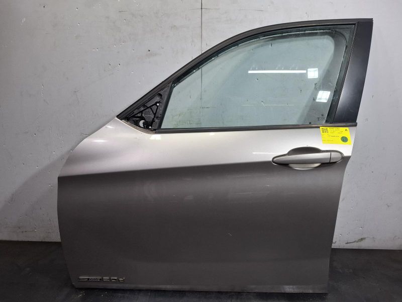 2010 BMW X1 — Left Front Door